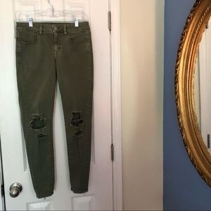 Distressed olive green American Eagle jeggings